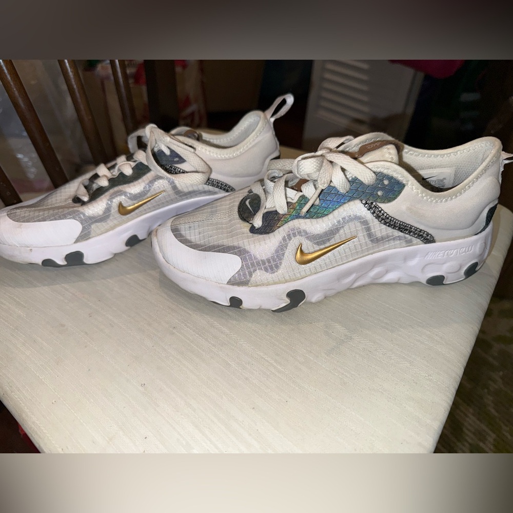 Nike Kids White Sneakers with Gold Accents
